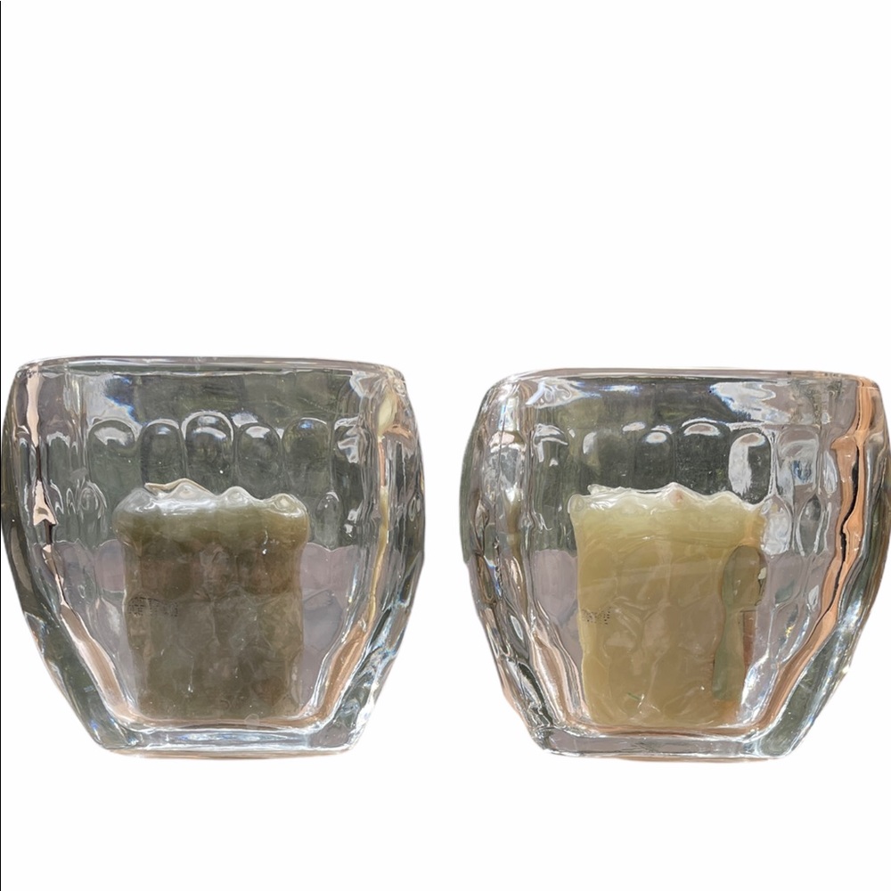 Distinct decor! Two clear textured lead crystal votive candle holders.